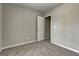 Neutral-colored bedroom with textured ceiling at 1600 Coal Shovel Ne Trl, Conyers, GA 30013