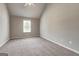 Spacious bedroom featuring neutral walls and carpet at 1600 Coal Shovel Ne Trl, Conyers, GA 30013