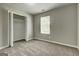 Bedroom featuring a closet and a window at 1600 Coal Shovel Ne Trl, Conyers, GA 30013