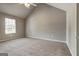 Large bedroom features carpet floors, a ceiling fan, and a vaulted ceiling, freshly painted at 1600 Coal Shovel Ne Trl, Conyers, GA 30013