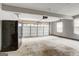 Spacious garage with an automatic door and additional space for storage at 1600 Coal Shovel Ne Trl, Conyers, GA 30013