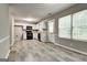 Bright kitchen features modern appliances, white cabinetry, and views to the outdoors at 1600 Coal Shovel Ne Trl, Conyers, GA 30013