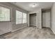 Functional laundry area with closet space, neutral walls, and convenient access to the exterior at 1600 Coal Shovel Ne Trl, Conyers, GA 30013