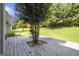 View of deck with built-in planters overlooking the spacious backyard at 345 Kerrith Dr, Stockbridge, GA 30281