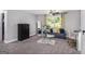 Cozy bedroom with neutral walls, carpeted floor, and natural light at 345 Kerrith Dr, Stockbridge, GA 30281