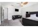 Bedroom with futon, TV and ceiling fan at 345 Kerrith Dr, Stockbridge, GA 30281