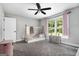 Light filled bedroom with carpeted floor, window with a view, and teepee at 345 Kerrith Dr, Stockbridge, GA 30281
