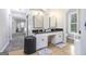 Bathroom featuring double vanity, tile flooring, and a separate toilet room at 345 Kerrith Drive Dr, Stockbridge, GA 30281
