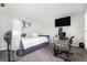 Carpeted bedroom with daybed, workspace, and a stylish lamp at 345 Kerrith Drive Dr, Stockbridge, GA 30281