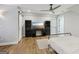Bedroom featuring wood floors, ceiling fan, desk and great lighting at 3612 Bill Gardner Pkwy, Locust Grove, GA 30248