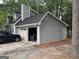 View of the home's exterior, showing the siding, roof, and garage at 4514 Tifton Ct, Powder Springs, GA 30127