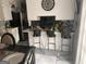 Kitchen view with barstool seating, countertops, and stainless steel appliances at 4514 Tifton Ct, Powder Springs, GA 30127