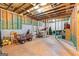 An unfinished basement with exposed beams and a concrete floor at 360 Grandmas Ln, Fayetteville, GA 30215