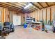 Spacious unfinished basement with tools and storage, ready for your personal touch and customization at 360 Grandmas Ln, Fayetteville, GA 30215