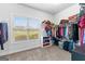 Walk-in closet with window and built in shelving at 360 Grandmas Ln, Fayetteville, GA 30215