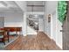 Inviting foyer with hardwood floors, staircase, and an open view into other rooms at 360 Grandmas Ln, Fayetteville, GA 30215