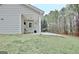 View of covered back porch features a grill and some outdoor furniture at 131 Meadowbrook Ln, Grantville, GA 30220