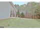 Backyard includes a patio for relaxing and green lawn space at 131 Meadowbrook Ln, Grantville, GA 30220