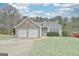 Appealing single-Gathering home offering stone accents, vinyl siding, an attached two-car garage, and established landscaping at 131 Meadowbrook Ln, Grantville, GA 30220