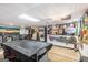Basement area with pool table, bar, and sports memorabilia at 6230 S Summers Cir, Douglasville, GA 30135