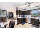 Open-concept kitchen featuring stainless steel appliances, and easy access to other rooms at 6230 S Summers Cir, Douglasville, GA 30135
