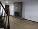 Basement featuring a stone fireplace and stairs at 205 Avon Dr, Fayetteville, GA 30215