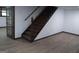 Basement stairs leading down to a finished space at 205 Avon Dr, Fayetteville, GA 30215