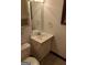Bathroom featuring a single sink vanity and toilet at 205 Avon Dr, Fayetteville, GA 30215