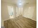 Bright, airy bedroom featuring wood floors, ceiling fan, and multiple closets for ample storage space at 241 Perimeter Walk, Atlanta, GA 30338