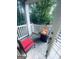 Cozy outdoor patio featuring fire pit and comfortable seating, surrounded by lush greenery at 241 Perimeter Walk, Atlanta, GA 30338
