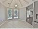 Bright breakfast nook featuring tile flooring and view to backyard at 107 Jennings Yard, Peachtree City, GA 30269