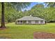 Charming single-story home with a covered porch and well-maintained front lawn at 107 Jennings Yard, Peachtree City, GA 30269