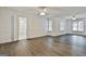 Spacious main bedroom with wood floors, and ensuite bathroom at 107 Jennings Yard, Peachtree City, GA 30269