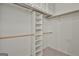 Walk-in closet with custom shelving and ample storage space at 107 Jennings Yard, Peachtree City, GA 30269