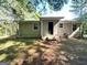 This backyard features mature trees and a flat lawn at 604 Thomasville Blvd, Atlanta, GA 30315