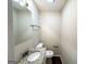 Powder room featuring granite countertops, an undermount sink, and hardwood floors at 604 Thomasville Blvd, Atlanta, GA 30315