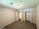 Carpeted bedroom with an open closet at 604 Thomasville Blvd, Atlanta, GA 30315