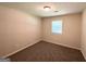 Bedroom with carpeted floors and a window at 604 Thomasville Blvd, Atlanta, GA 30315