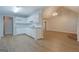 Open floor plan kitchen with white cabinets, modern countertops, and stainless steel appliances at 1917 Kevin Se Dr, Conyers, GA 30013