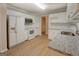 Well-lit kitchen featuring granite counters, and ample cabinet space at 1917 Kevin Se Dr, Conyers, GA 30013