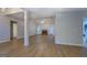 Bright living room with a brick fireplace, neutral walls, and access to outdoor patio at 1917 Kevin Se Dr, Conyers, GA 30013