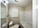 Bright bathroom featuring a tub and shower combination, and modern fixtures at 2469 Baywood Se Dr, Atlanta, GA 30315
