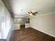 Bright living room with hardwood floors, ceiling fan, and natural light at 2469 Baywood Se Dr, Atlanta, GA 30315