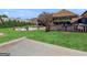 The lush backyard includes a fire pit, a wooden fence, a patio, and plenty of space at 200 Magnolia Ct, Mcdonough, GA 30252