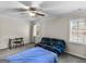 Bright bedroom with carpet, ceiling fan and two windows at 200 Magnolia Ct, Mcdonough, GA 30252