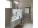 Bright bathroom with a soaking tub, tiled backsplash, and neutral decor at 160 Elysian Dr, Fayetteville, GA 30214