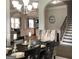 Dining room view showing the dining table, decor, and archways into other areas of the house at 160 Elysian Dr, Fayetteville, GA 30214