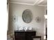 Close up on an elegant dining room showing decorative wall art, lighting, and a side buffet at 160 Elysian Dr, Fayetteville, GA 30214