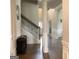 Inviting foyer showcasing an elegant staircase and beautiful hardwood flooring at 160 Elysian Dr, Fayetteville, GA 30214