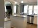 Open-concept kitchen with stainless steel appliances at 160 Elysian Dr, Fayetteville, GA 30214